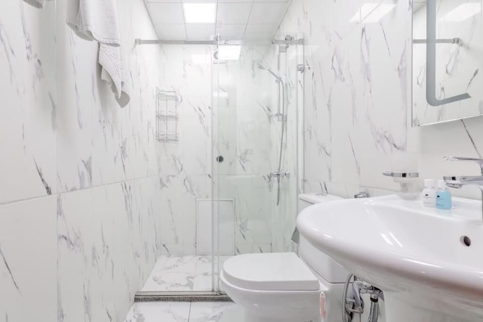 Shower, free toiletries, hair dryer, slippers