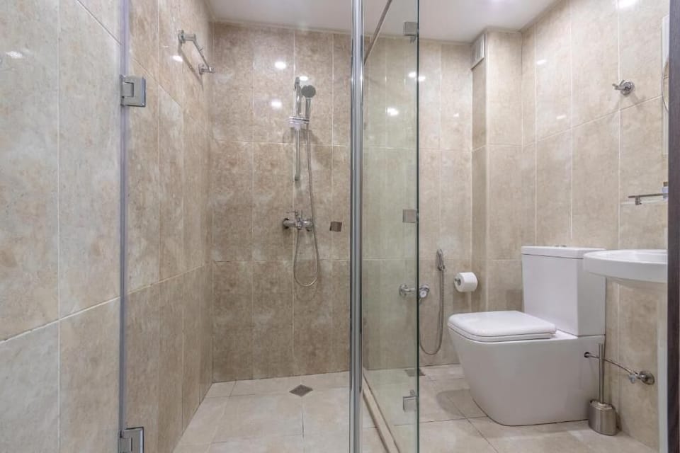 Shower, free toiletries, hair dryer, slippers
