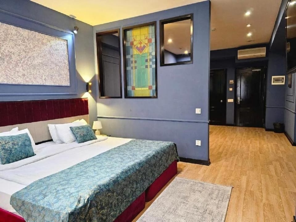 Family Triple Room, City View | Premium bedding, Select Comfort beds, minibar, in-room safe