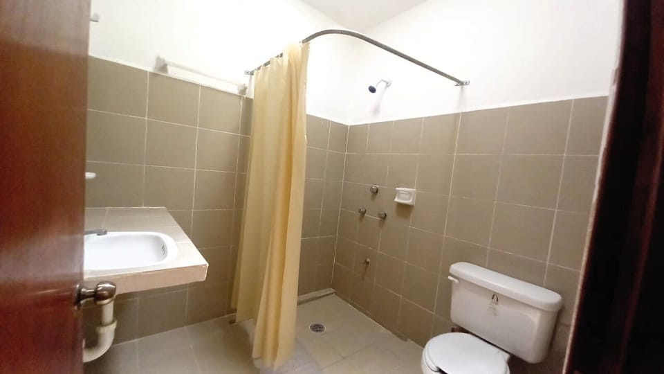 Basic Double Room | Bathroom | Shower, towels, soap, shampoo