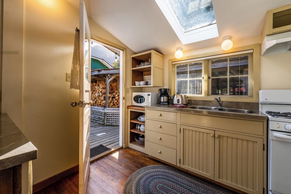 Lady Alexandra Cottage #1 | Private kitchen | Fridge, microwave, oven, stovetop