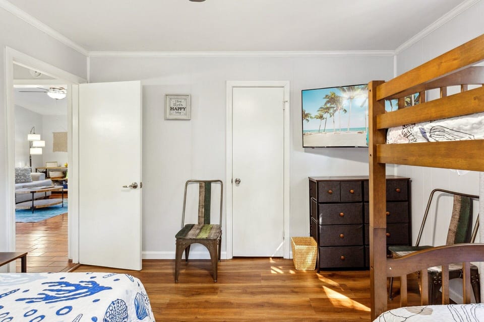 Get the kids settled into the bedroom with a Bunk Bed and a Full Bed, as well as a TV!