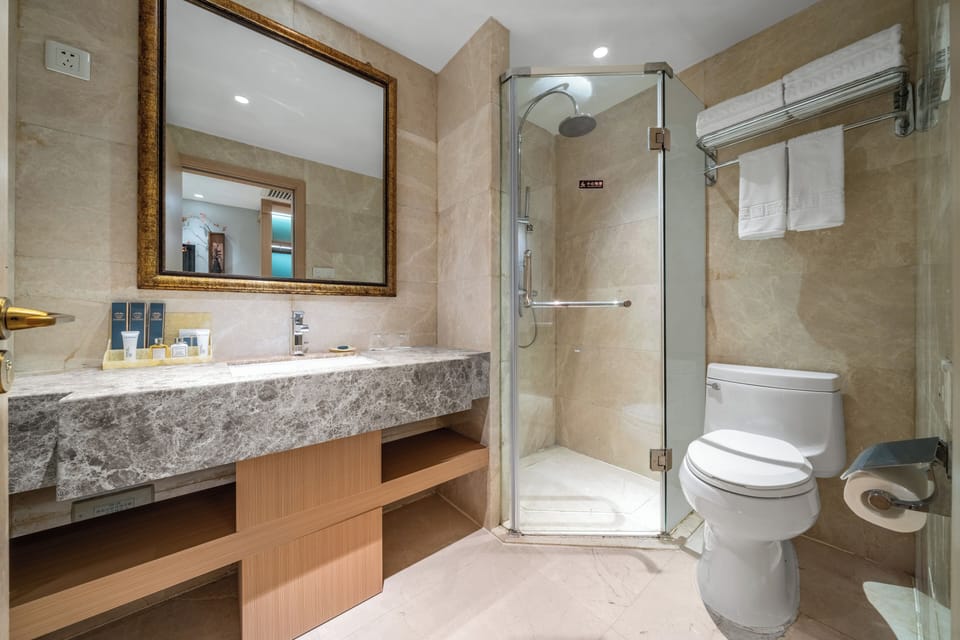 Family Triple Room | Bathroom | Separate tub and shower, hair dryer, bathrobes, towels