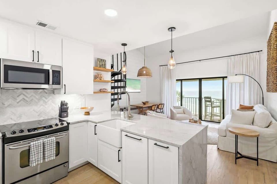 Kitchen island includes seating for three.