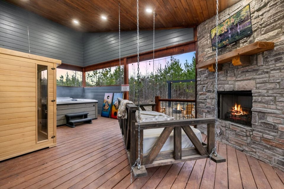 There`s something about gathering on a covered porch with a fireplace crackling beside you and the forest stretching out in every direction that makes you realize you`ve found exactly what you were looking for.