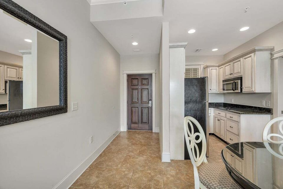 Sea Gate #204 View of Entry Hallway  and Kitchen from Dining Area