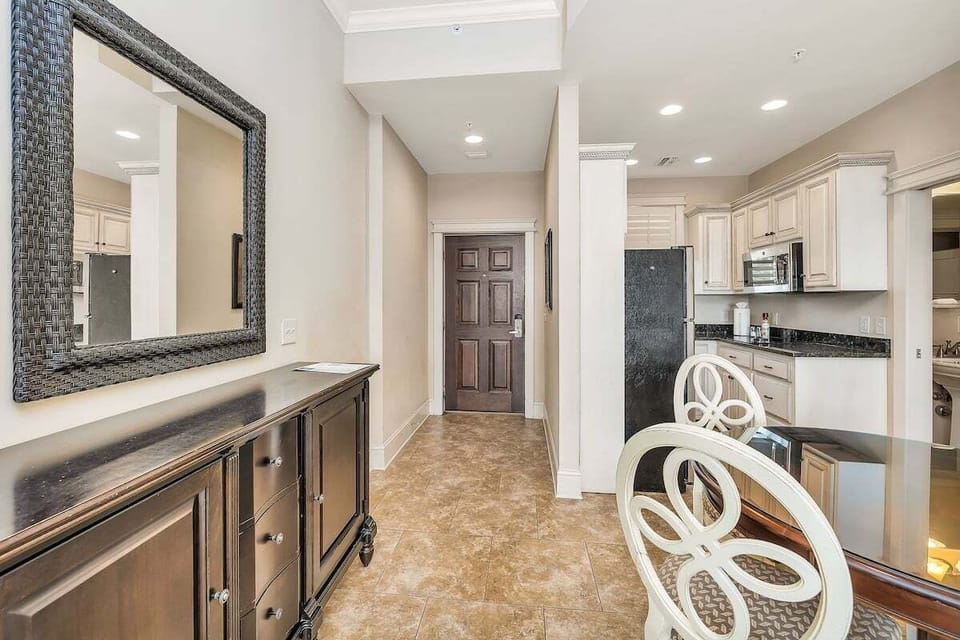 Sea Gate #206 View of Entry Hallway  and Kitchen from Dining Area