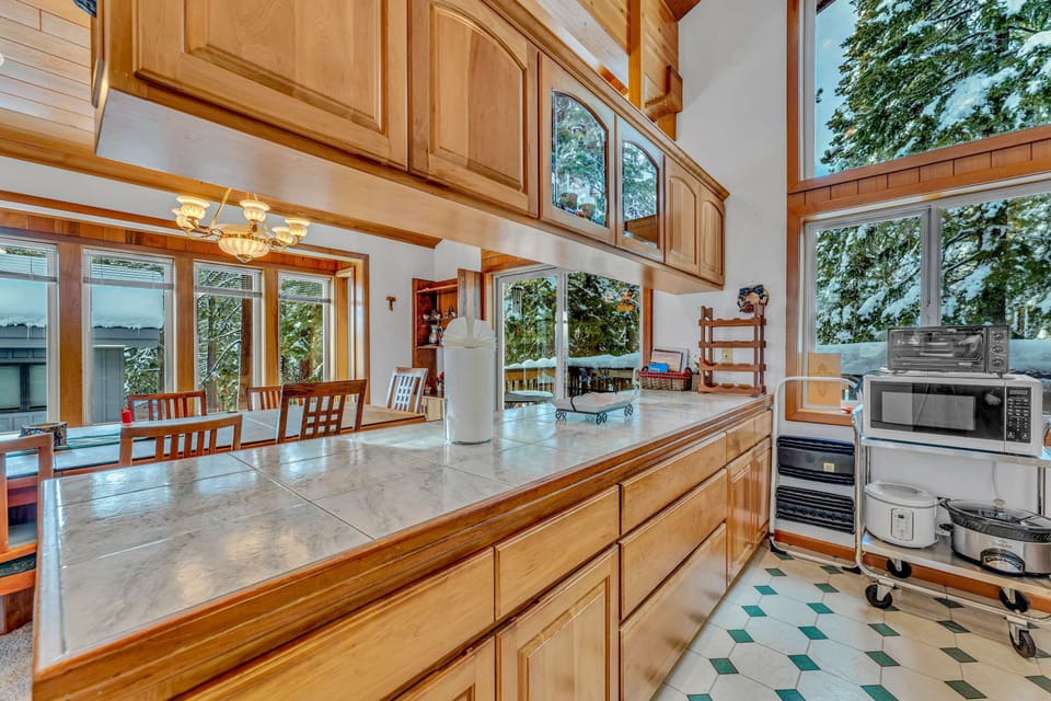Kitchen: Crockpot, drip coffee maker, toaster oven, blender, dishwasher, cooking utensils, main floor