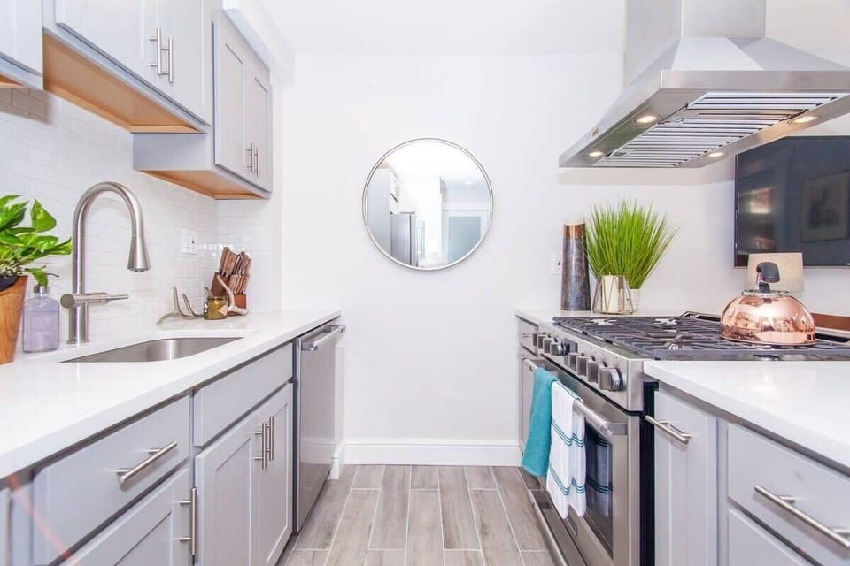Open Concept Chef's Kitchen | Fully Stocked | Gas Range | First Floor
