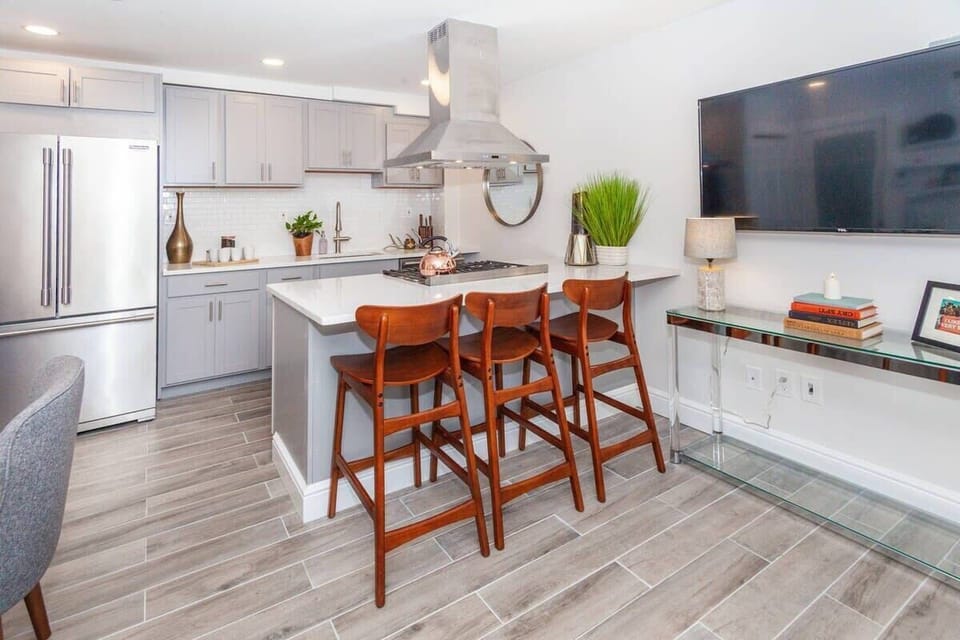 Open Concept Living Room | XL Flat Screen TV | Natural Light | First Floor
