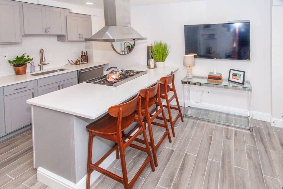 Open Concept Living Room | XL Flat Screen TV | Natural Light | First Floor

