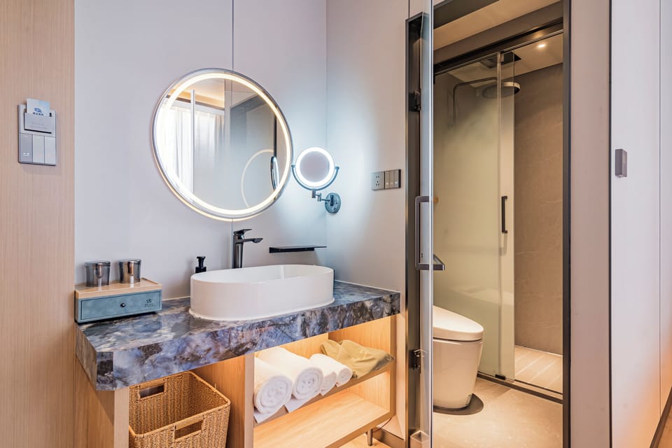 Shower, free toiletries, hair dryer, slippers