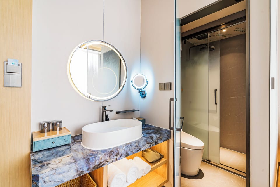 Shower, free toiletries, hair dryer, slippers