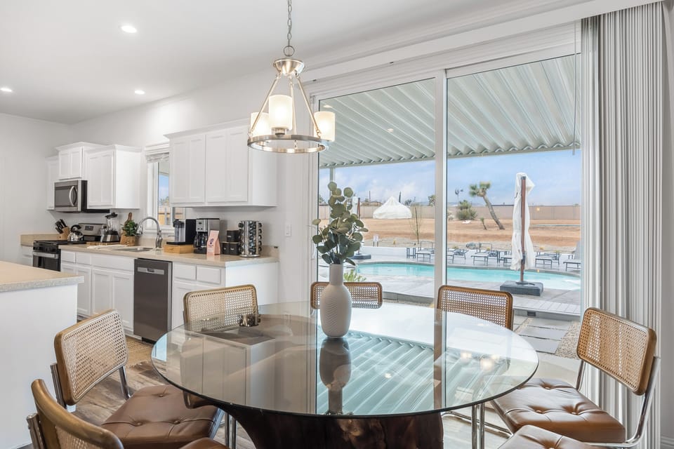 Dining area with direct access to the pool/backyard.