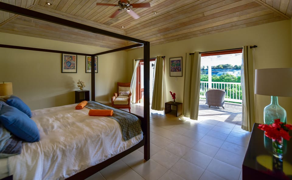 Master bedroom with terrace and river views
