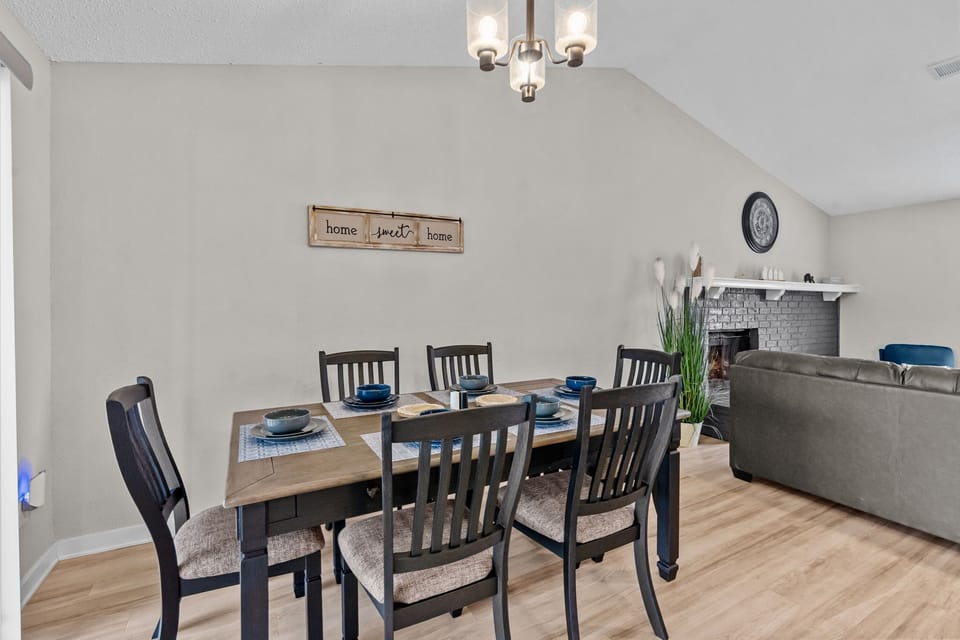 The open space area has proximity from the kitchen to the dining table.