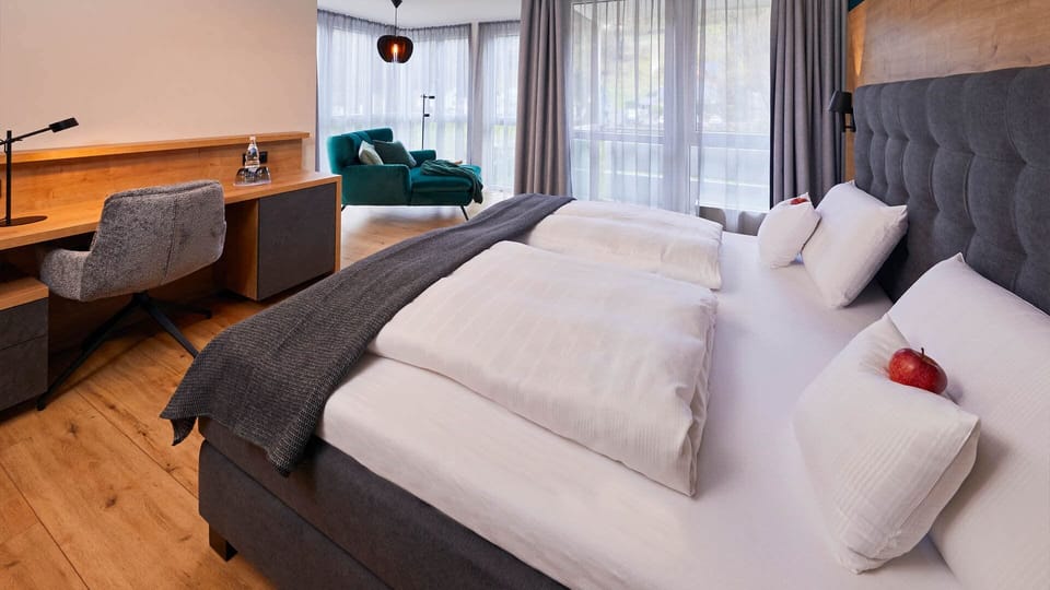 Deluxe Double Room, Balcony, Garden View | In-room safe, blackout drapes, WiFi (free), bed sheets