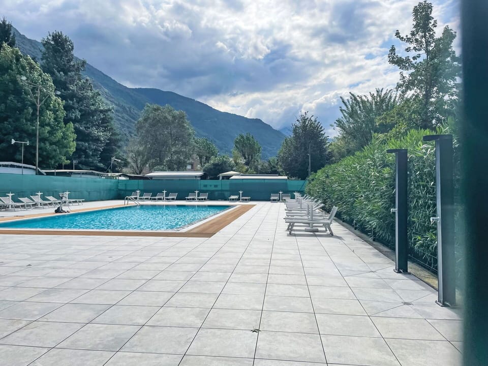 Swimming Pool, Mountain Range, Shade, Outdoor Furniture, Ridge, Alps, Evergreen