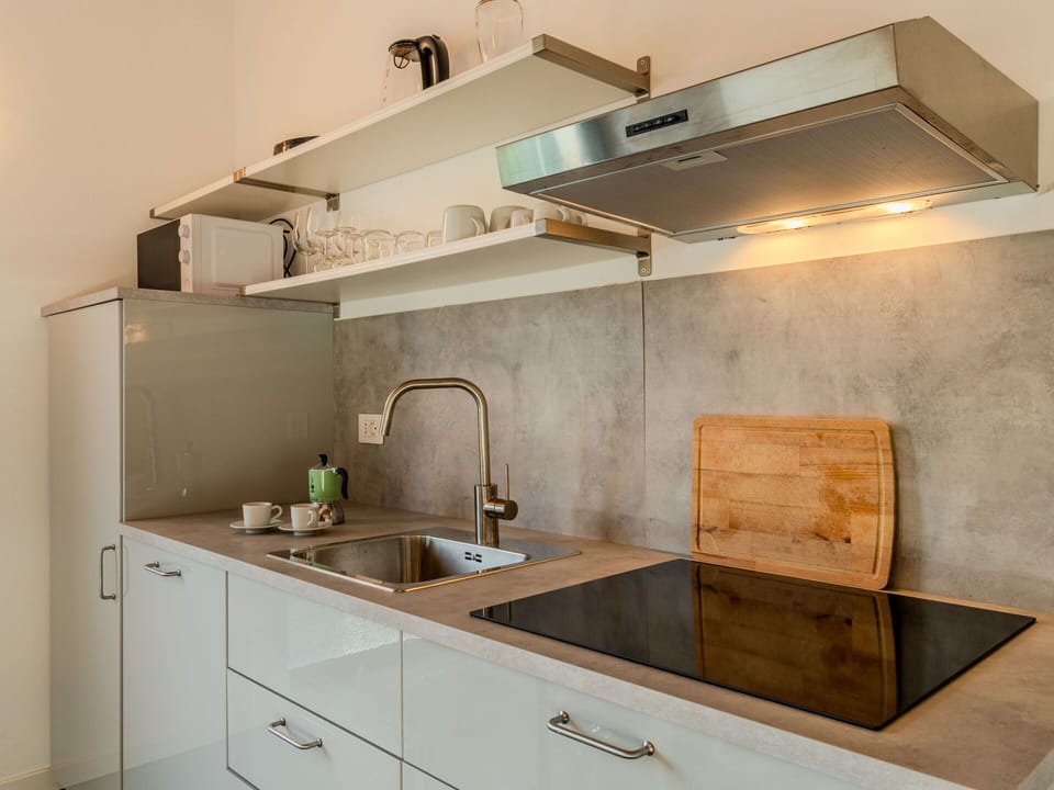 Kitchen, Countertop, Kitchen Appliance, Interior Design, Flooring, Cabinetry, Furniture, Kitchen Sink, Wood, Plumbing Fixture