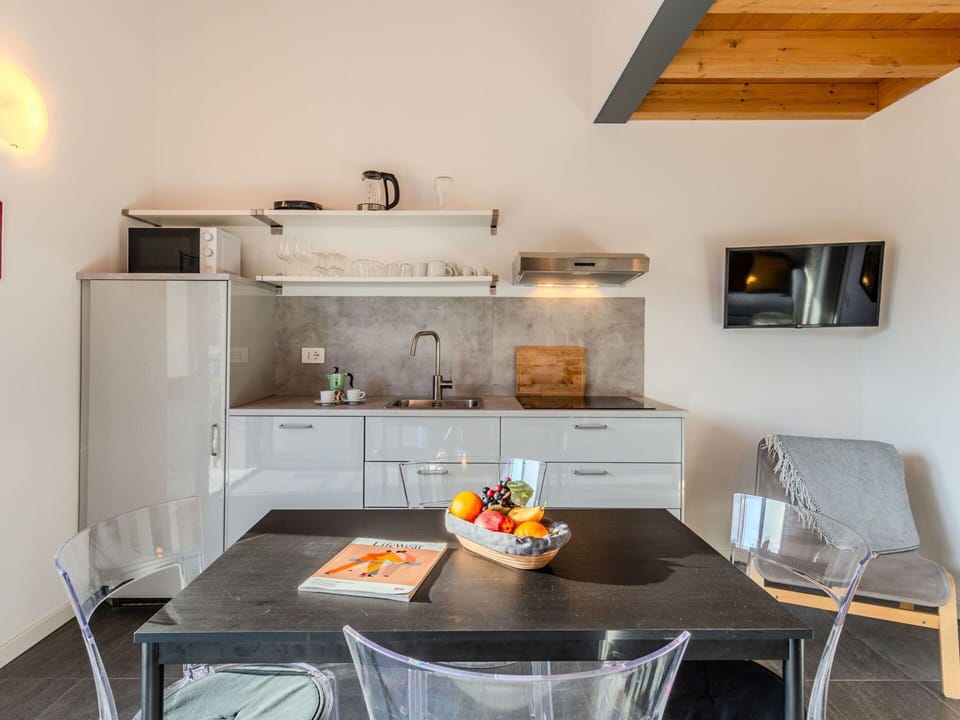 Furniture, Interior Design, Flooring, Ceiling, Lighting, Chair, Floor, Room, Table, Kitchen