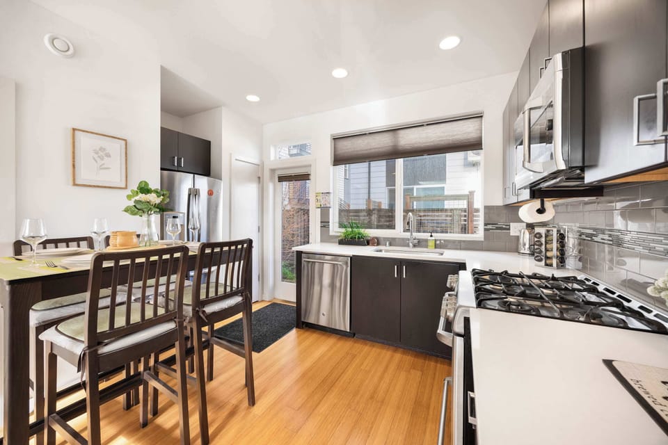 Large windows and skylights flood the space with natural light, creating a warm and inviting atmosphere.