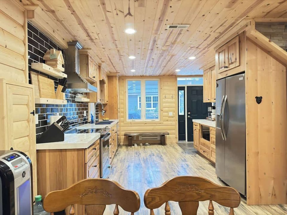 Warm, open-concept kitchen designed for gathering