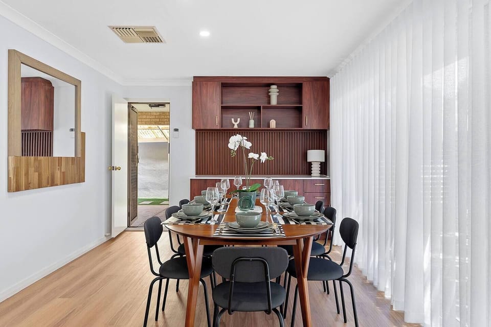 Gather around for dinner in our beautifully set dining room that’s perfect for sharing moments.