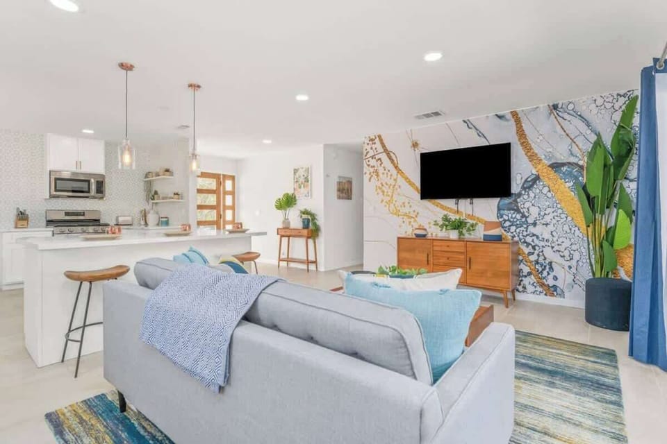Open floor plan: modern living room with west elm furniture.