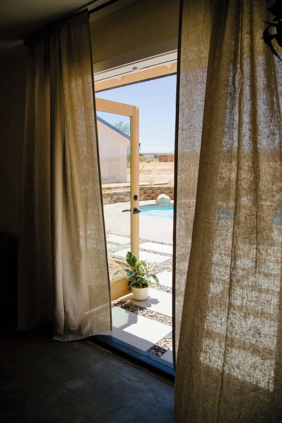 Many french doors lead you to pool hangs