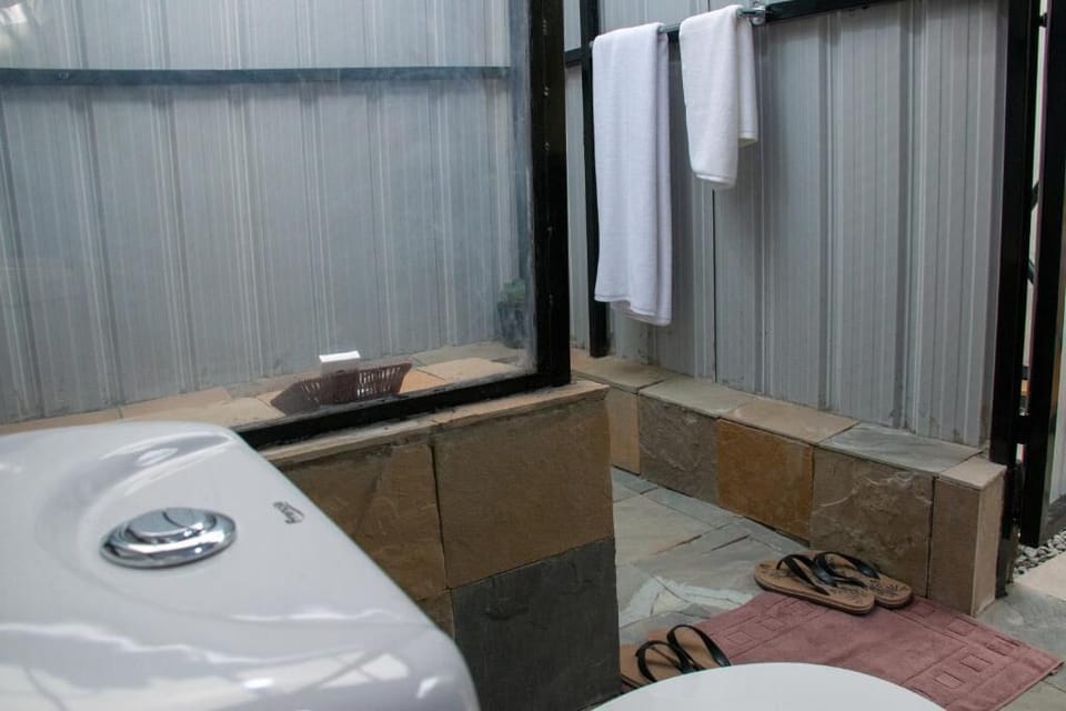 Luxury Tent, Non Smoking, Mountain View | Bathroom | Shower, slippers, towels, soap