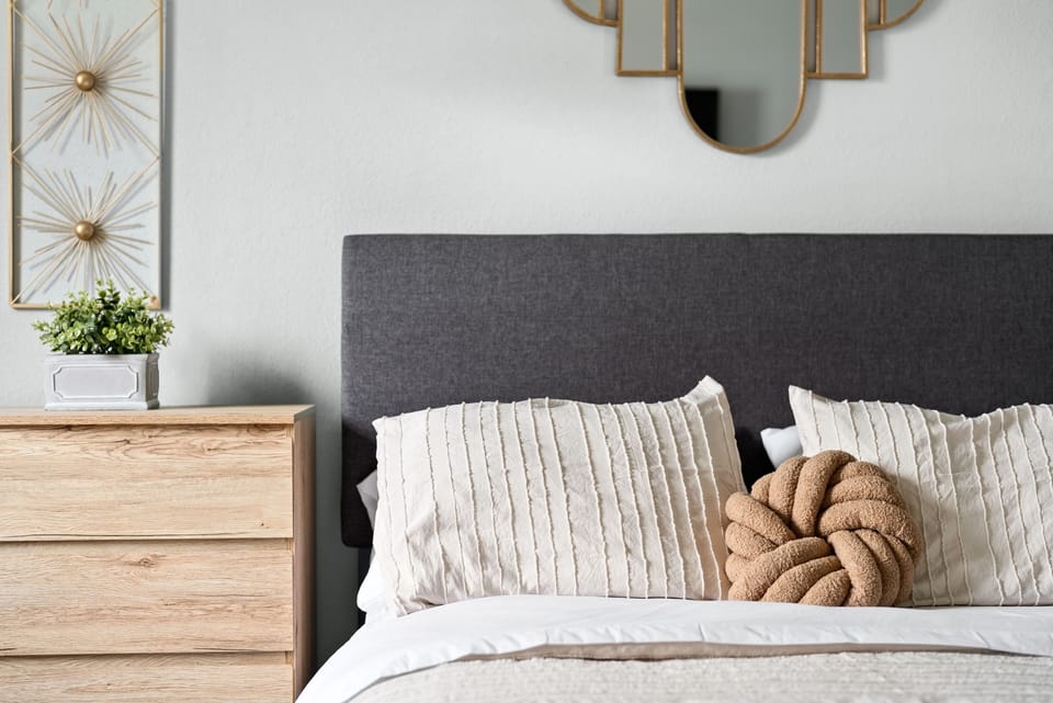 Elegant, sleek, and inviting—this bedroom exudes warmth and sophistication.