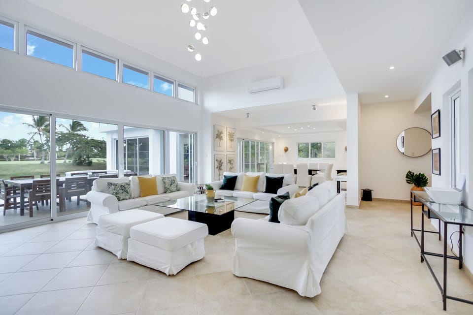 Elite Villa, Patio, Lake View | Living area | 55-inch plasma TV with cable channels