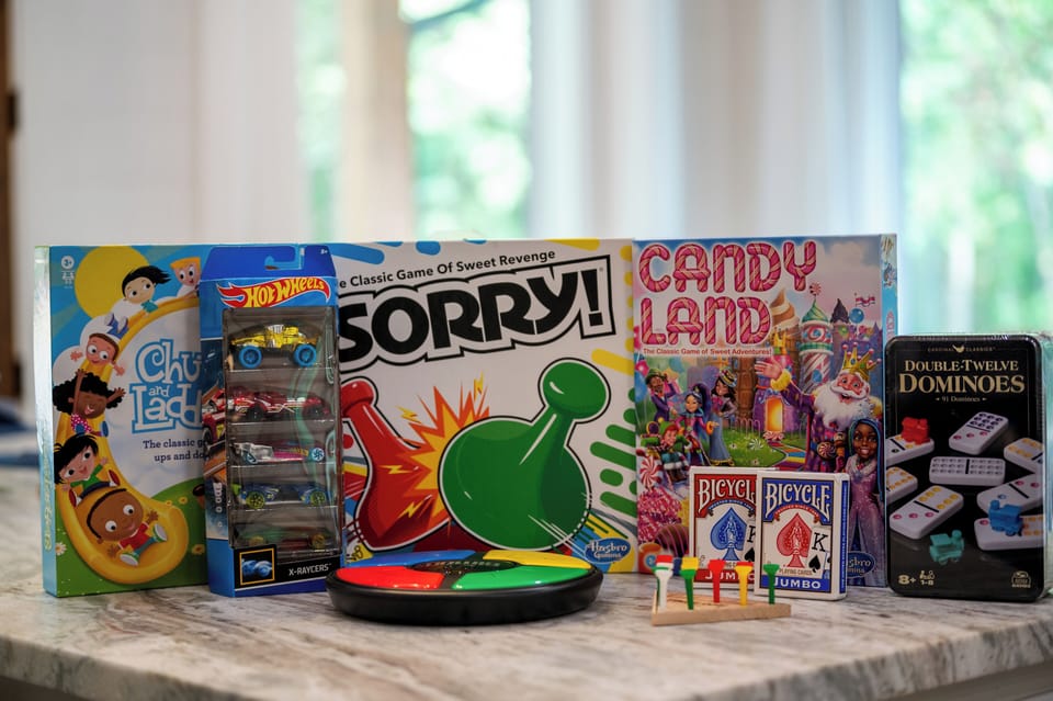 Dive into family fun with board games, Hot Wheels, and Dominoes.