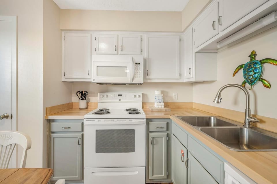The kitchen has brand-new countertops