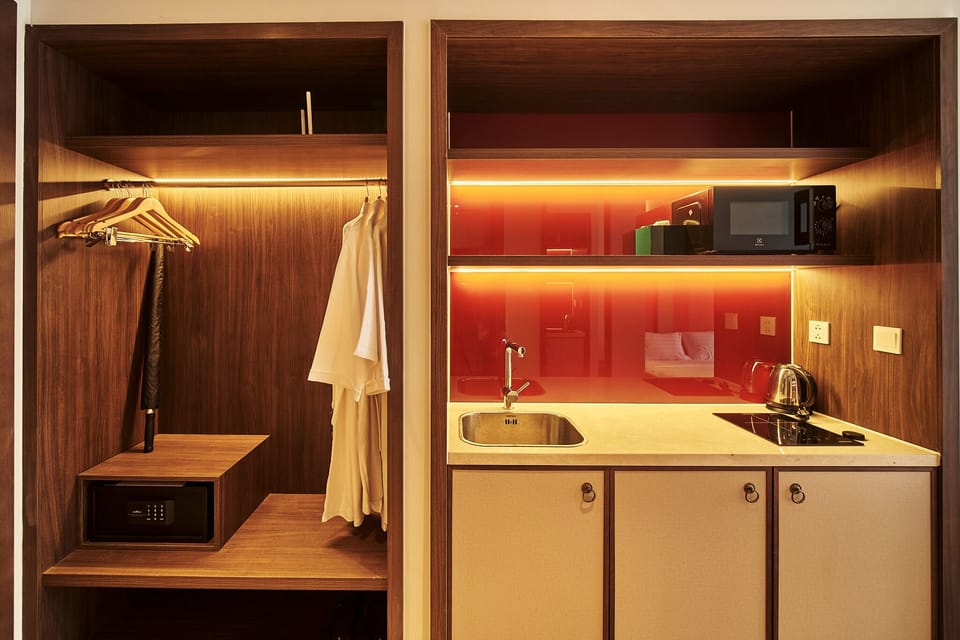 Family Studio, Pool View | Private kitchenette | Mini-fridge, microwave, stovetop, electric kettle