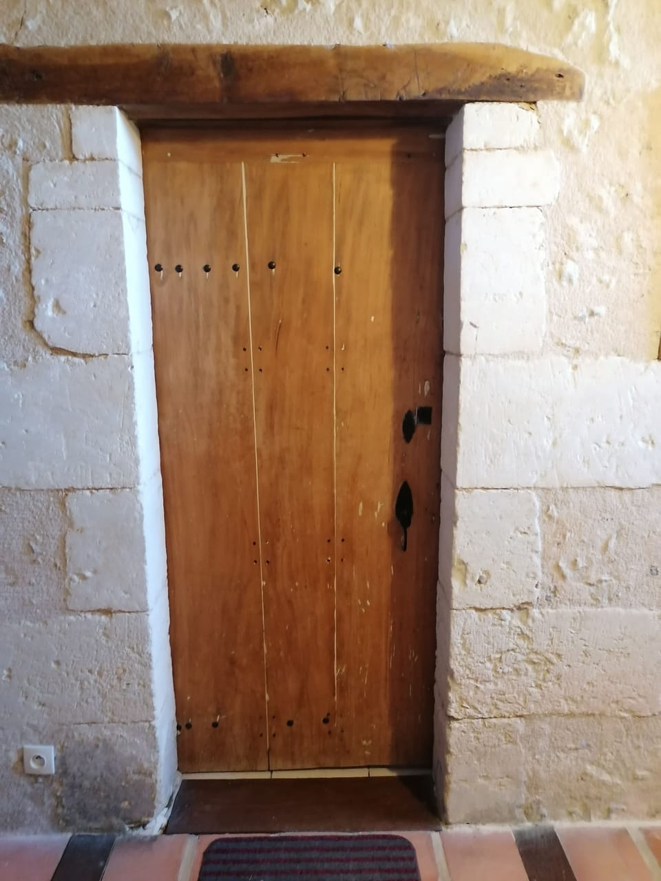 One of the two ground floor original doors
