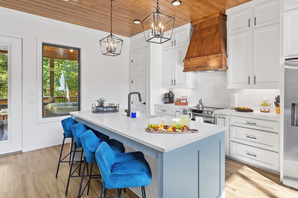 Chef’s kitchen with warm wood accents and modern charm. Perfect for cooking together, storytelling, and slow mornings surrounded by light.