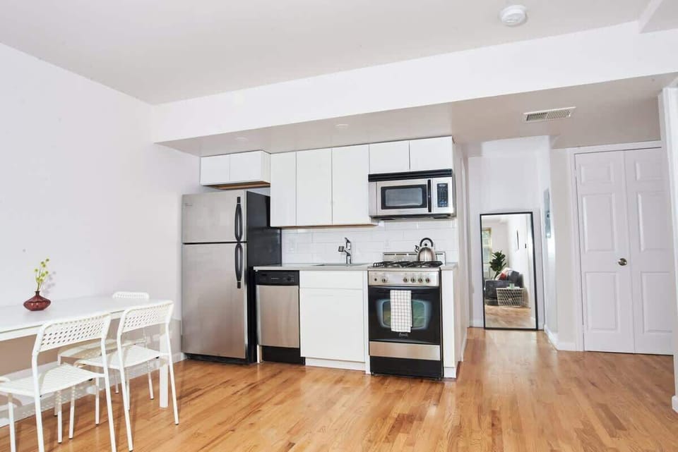 Full kitchen with table 