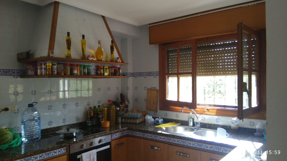 Deluxe Apartment, 3 Bedrooms, Partial Sea View | Private kitchen | Full-size fridge, microwave, oven, stovetop