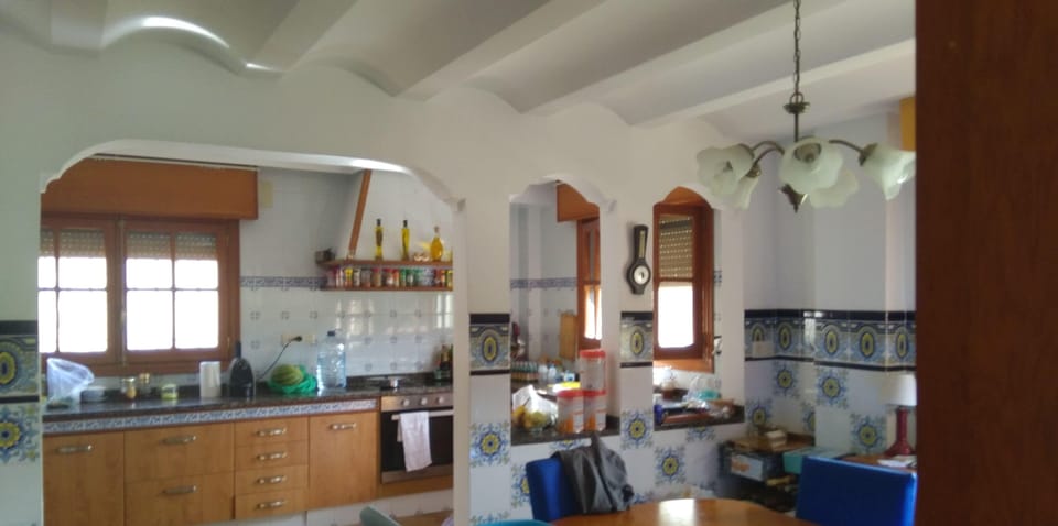 Deluxe Apartment, 3 Bedrooms, Partial Sea View | Private kitchen | Full-size fridge, microwave, oven, stovetop