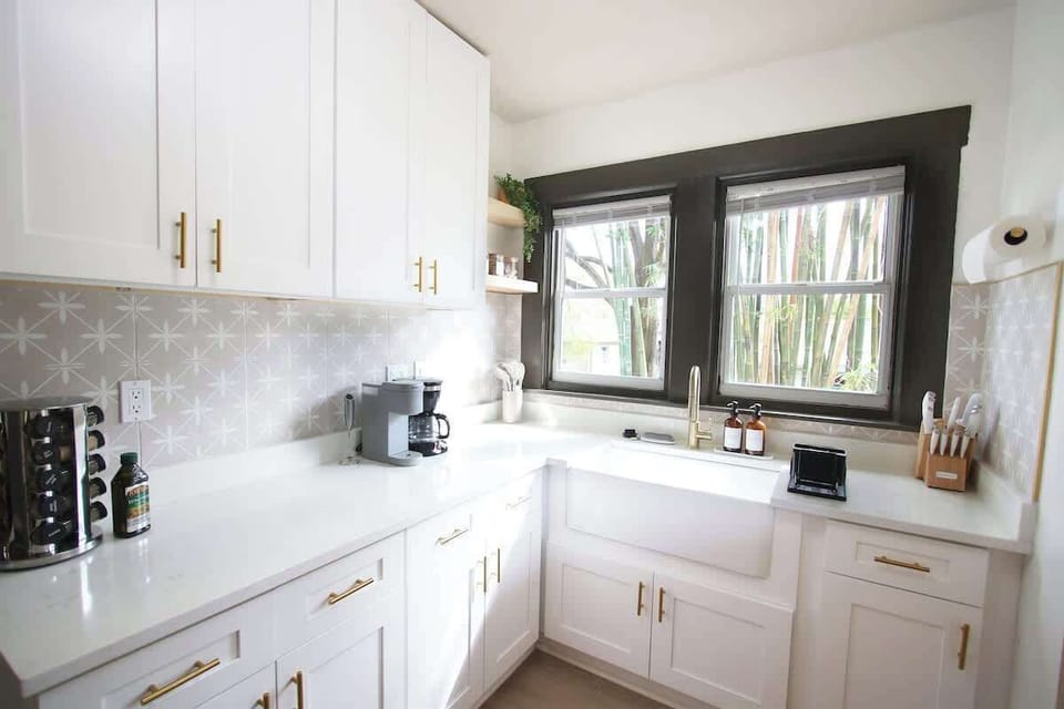 Enjoy our newly renovated, modern kitchen with brand new appliances, dishware, farmhouse sink and everything you need to cook up a storm! 