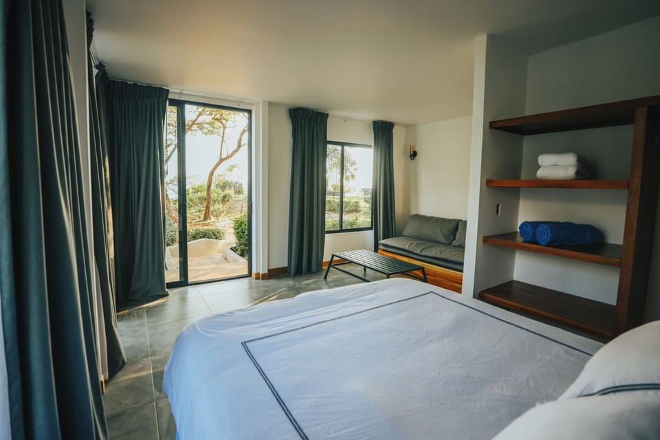 Deluxe Bungalow, 1 Queen Bed with Sofa bed, Beach View | Premium bedding, down comforters, minibar, in-room safe
