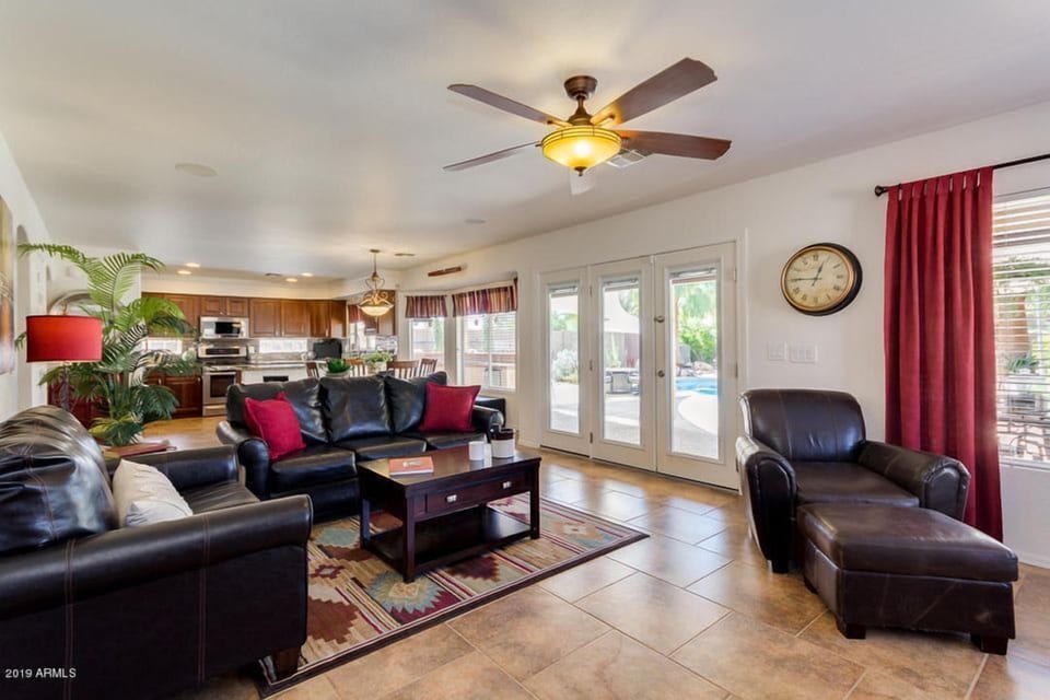House, Multiple Beds, Pool Access, City View (Blackfoot San Tan Valley) | Living area | Fireplace