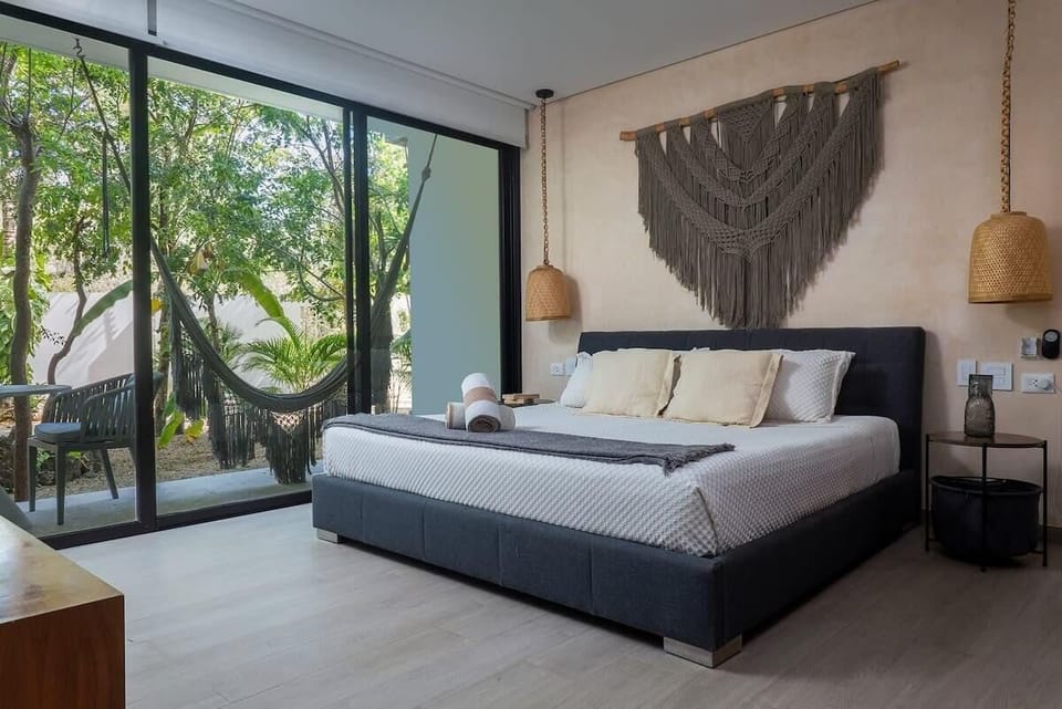 King-size bed with an exterior view.