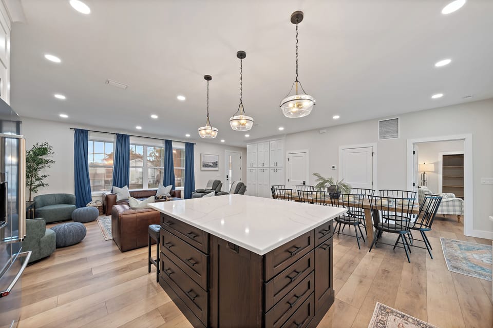 The open plan between the kitchen and living room area is perfect for keeping everyone included in the action!