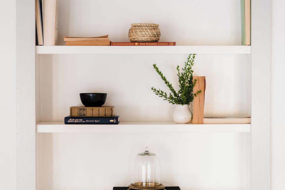Thoughtfully curated shelves add charm and warmth