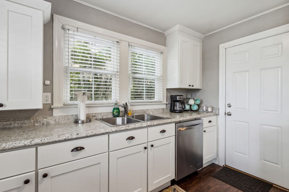 Drip Coffee Maker and Door that Leads to side Deck