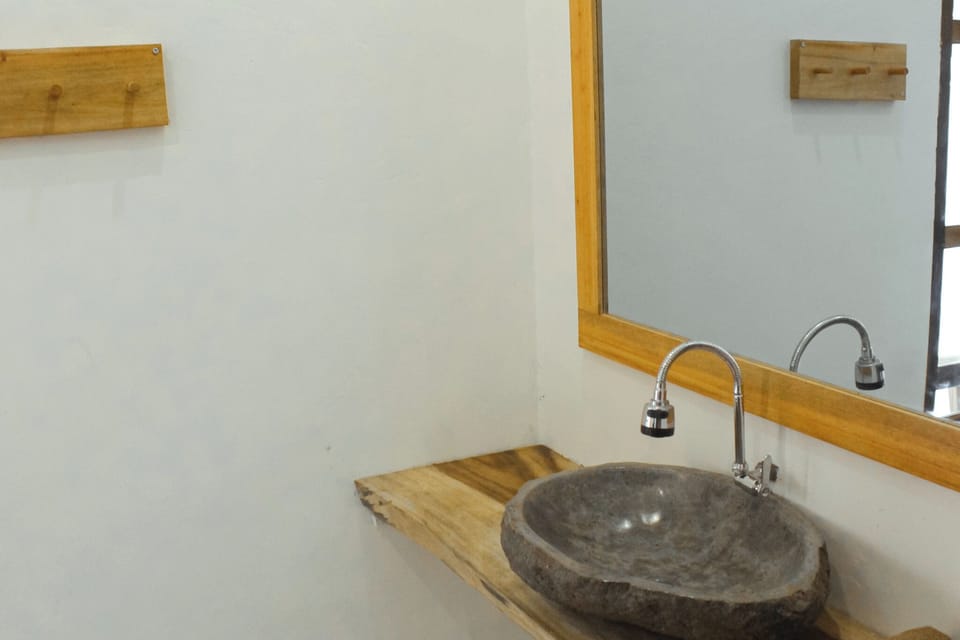 Deluxe Double Room, Pool View | Bathroom | Shower, eco-friendly toiletries, hair dryer (on request), towels