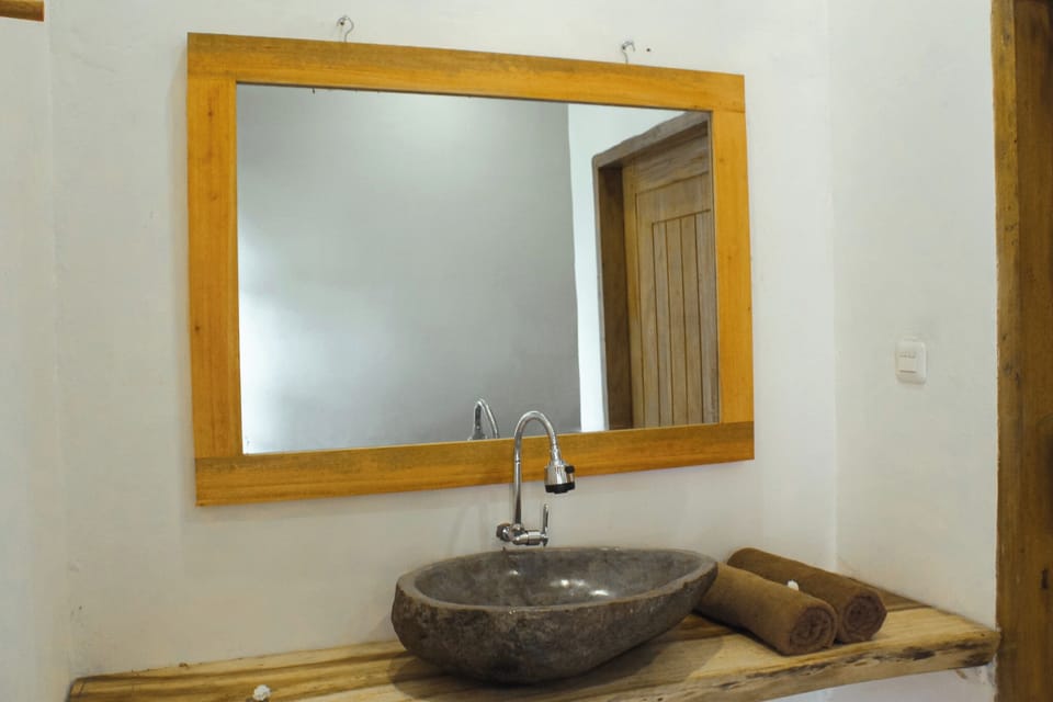 Deluxe Double Room, Pool View | Bathroom | Shower, eco-friendly toiletries, hair dryer (on request), towels