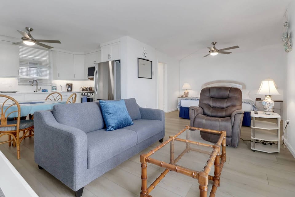 The studio condo is efficiently designed to include living room, dining, kitchen, and sleeping area all in one space.